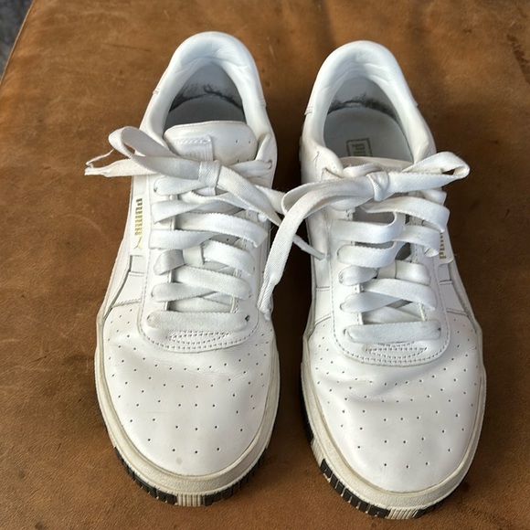 Puma Shoes - Puma women’s white leather size 10